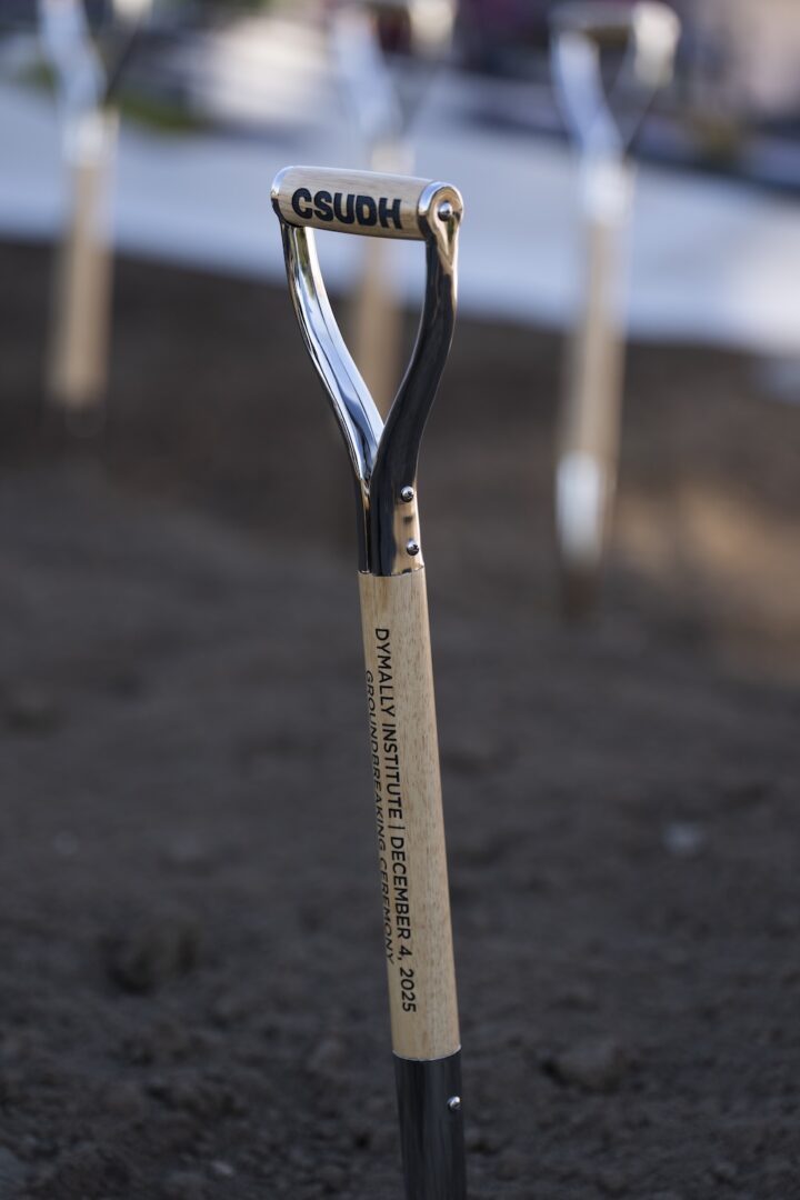 Engraved shovel at future Dymally site