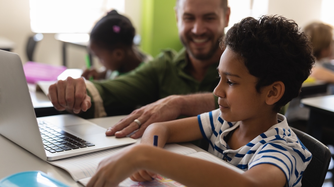 Student and teacher in classroom