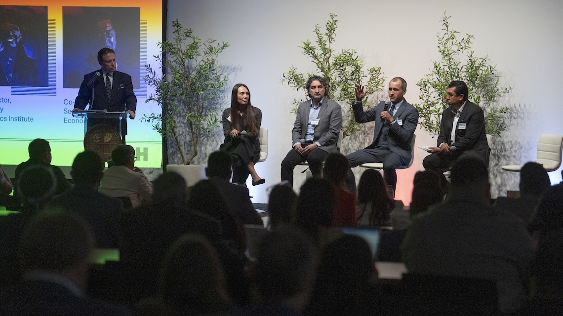 Economics panel onstage