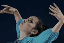 Dancer with arms outstretched