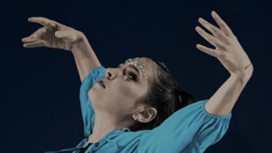 Dancer with arms outstretched