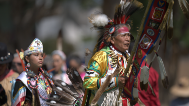 Eagle Staff Bearer, tribal Elder and veteran Richard Parker at the Powwow Grand Entry.