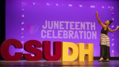 Dancer with CSUDH letters and Juneteenth Celebration sign