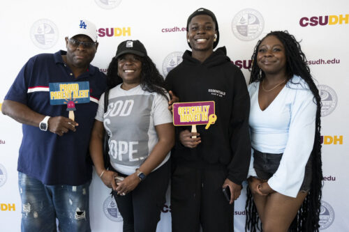A family poses for the camera during Move In Day 2026.